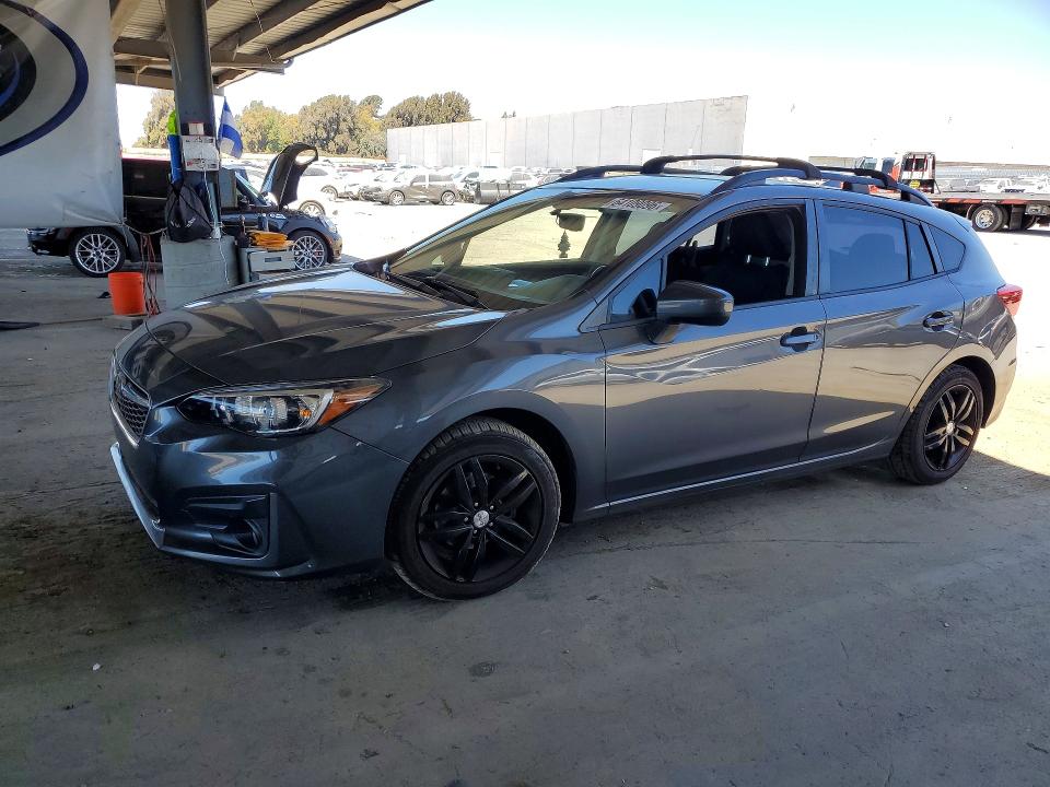SUBARU IMPREZA 2018 with VIN 4S3GTAD67J3700835 - Photo from auction