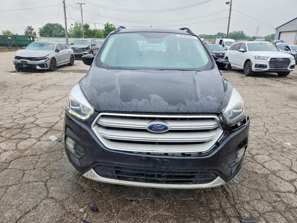 Photo 5 from auction – 2019 FORD ESCAPE with VIN 1FMCU9HD7KUB43385