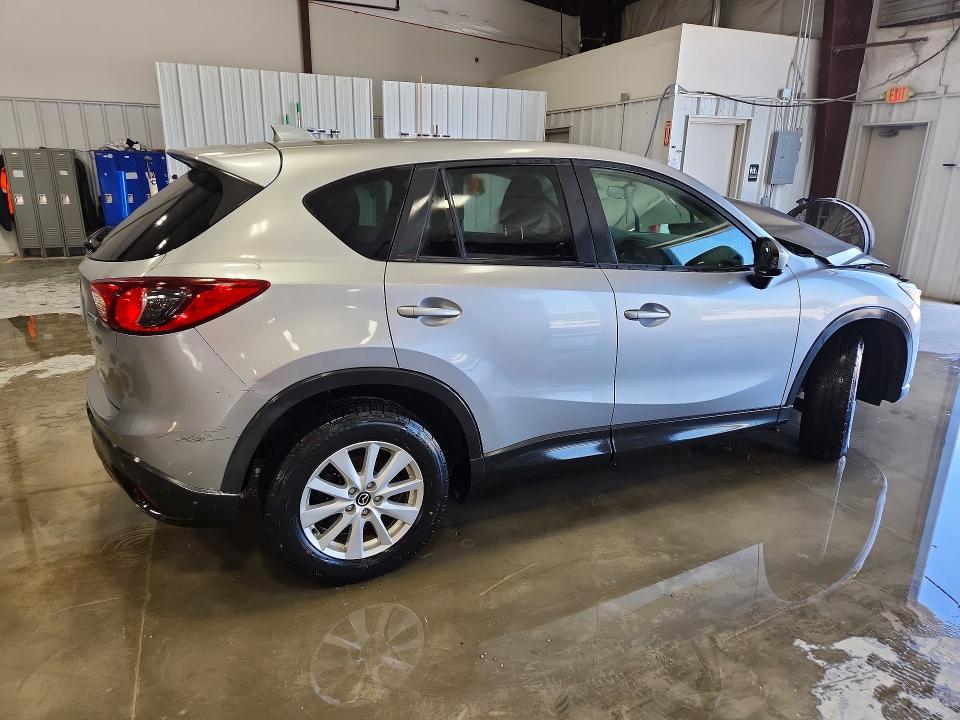 Photo 3 from auction – 2014 MAZDA CX-5 with VIN JM3KE2CY7E0316081