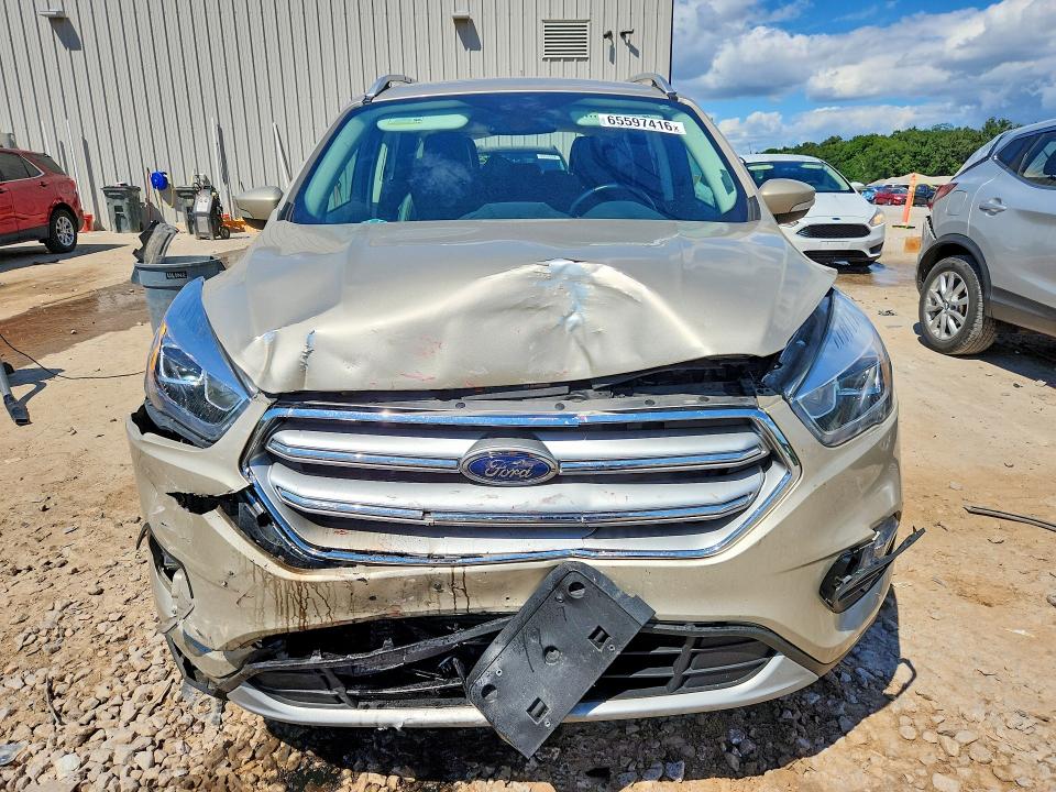 Photo 5 from auction – 2017 FORD ESCAPE with VIN 1FMCU9J97HUD86564