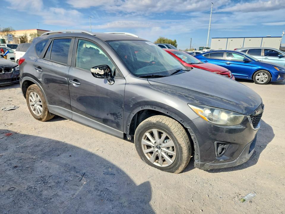 Photo 4 from auction – 2015 MAZDA CX-5 with VIN JM3KE2CY4F0514358