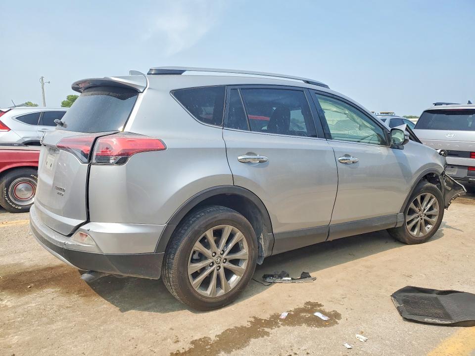Photo 3 from auction – 2018 TOYOTA RAV4 with VIN JTMDFREV2JJ237271