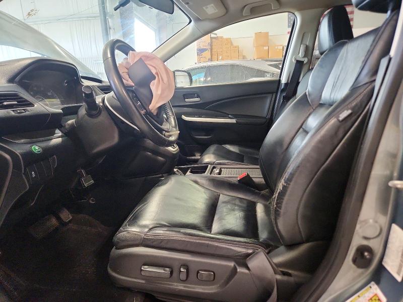 Photo 7 from auction – 2012 HONDA CR-V with VIN JHLRM4H72CC012791