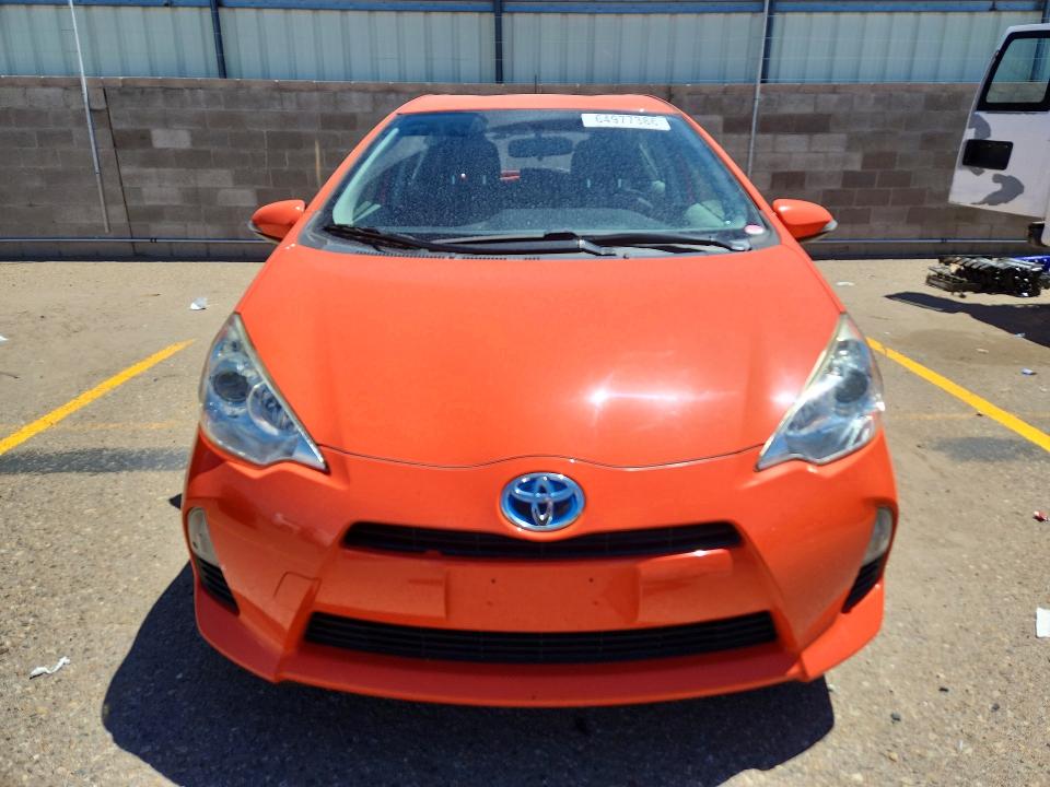 Photo 5 from auction – 2014 TOYOTA PRIUS C with VIN JTDKDTB33E1081650