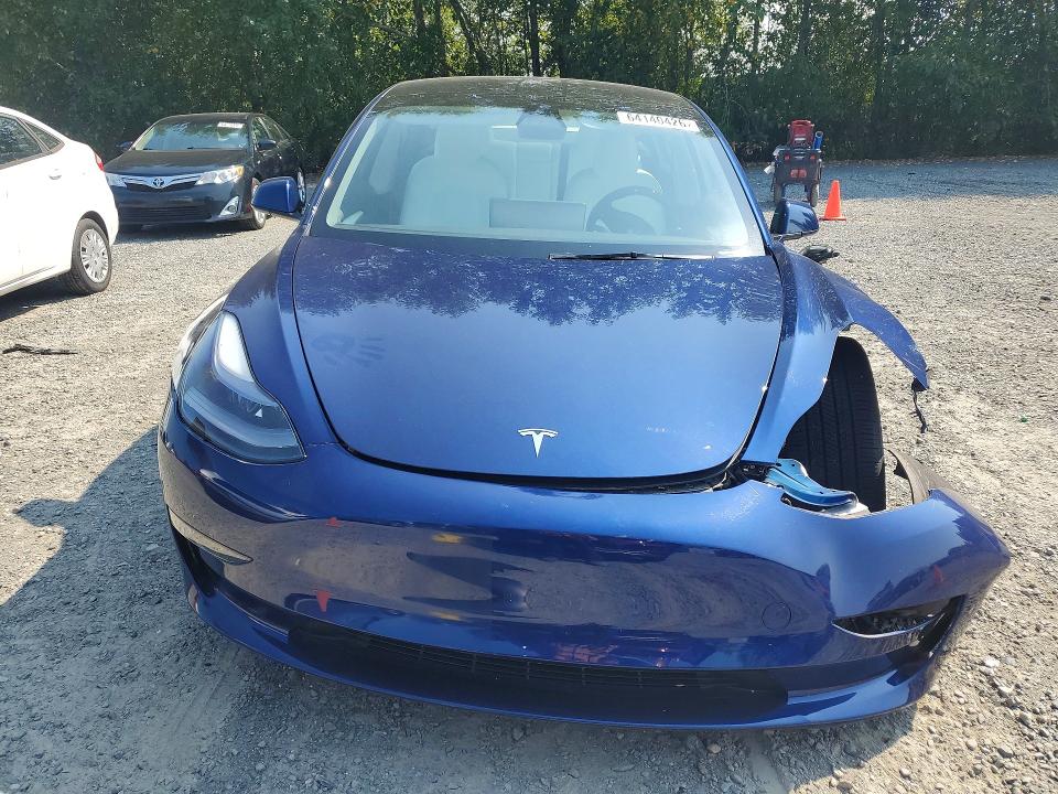 Photo 5 from auction – 2023 TESLA MODEL 3 with VIN 5YJ3E1EA9PF690218