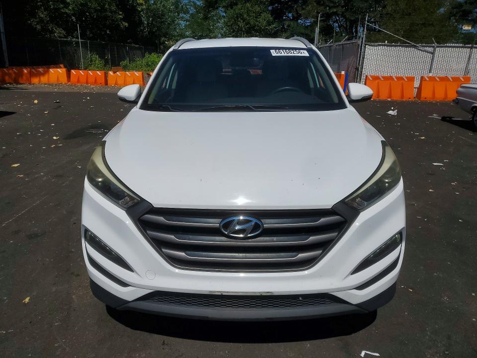 Photo 5 from auction – 2016 HYUNDAI TUCSON with VIN KM8J33A20GU162643