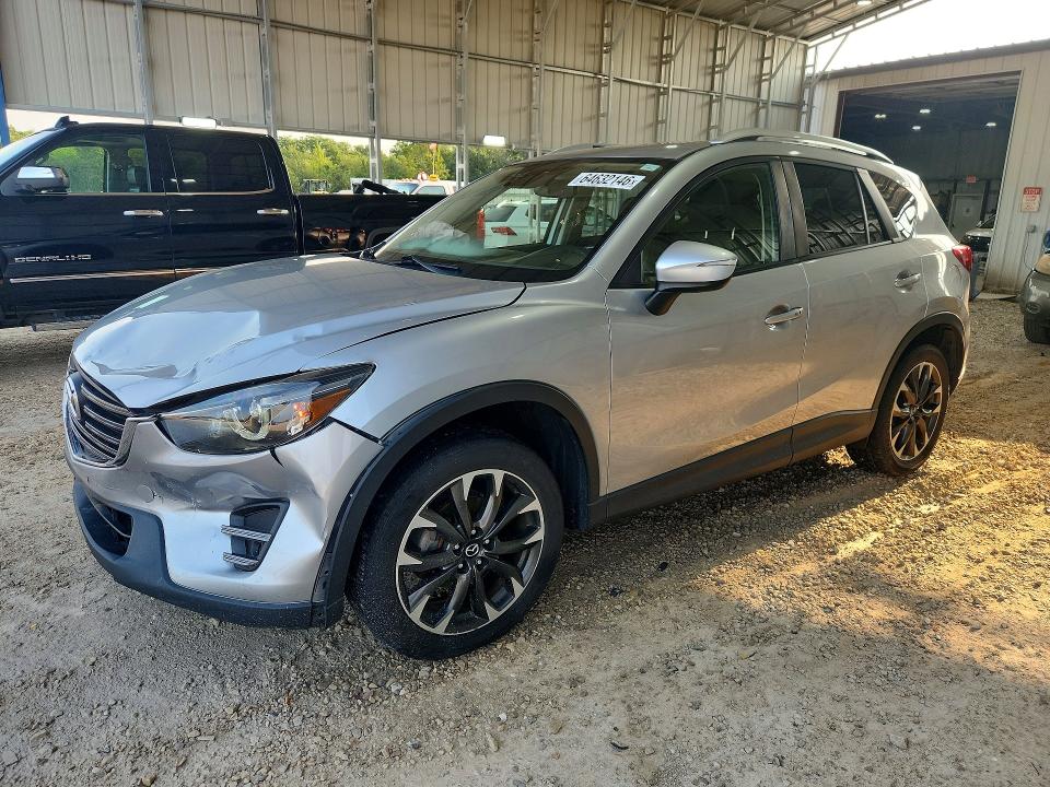 MAZDA CX-5 2016 with VIN JM3KE4DY9G0723512 - Photo from auction