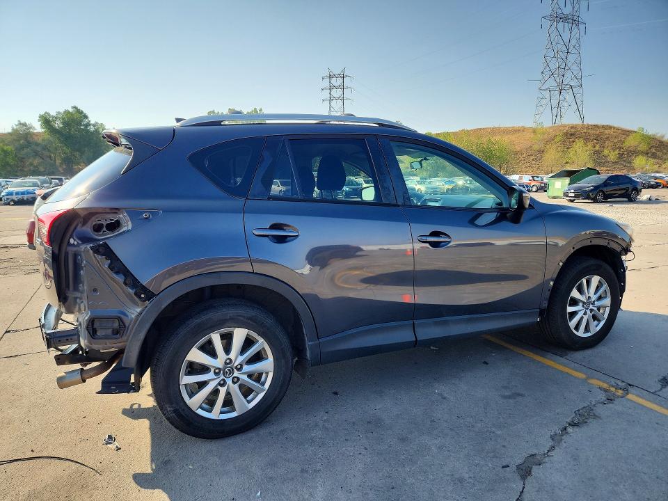 Photo 3 from auction – 2016 MAZDA CX-5 with VIN JM3KE2BYXG0670892