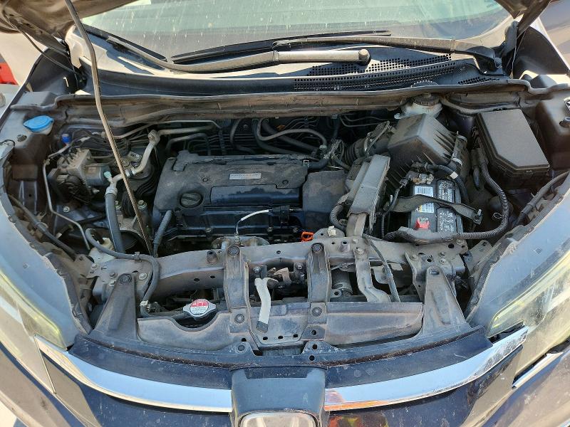 Photo 12 from auction – 2016 HONDA CR-V with VIN 5J6RM3H93GL011691