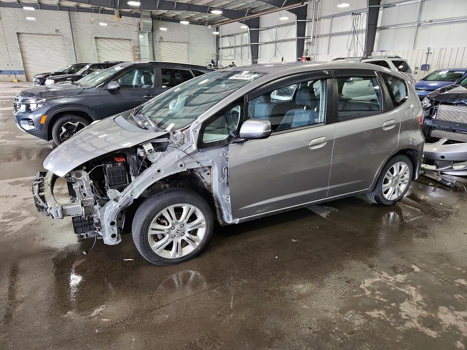 HONDA FIT 2010 with VIN JHMGE8H42AC003972 - Photo from auction