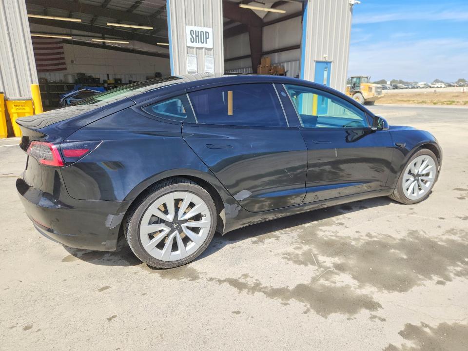 Photo 3 from auction – 2022 TESLA MODEL 3 with VIN 5YJ3E1EA9NF289684