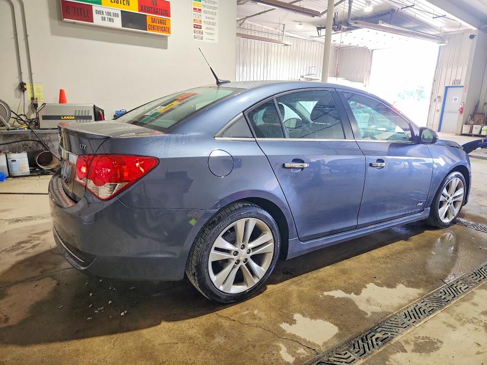 Photo 3 from auction – 2014 CHEVROLET CRUZE with VIN 1G1PG5SB1E7223600