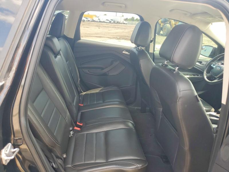 Photo 11 from auction – 2016 FORD ESCAPE with VIN 1FMCU9JX8GUA28225