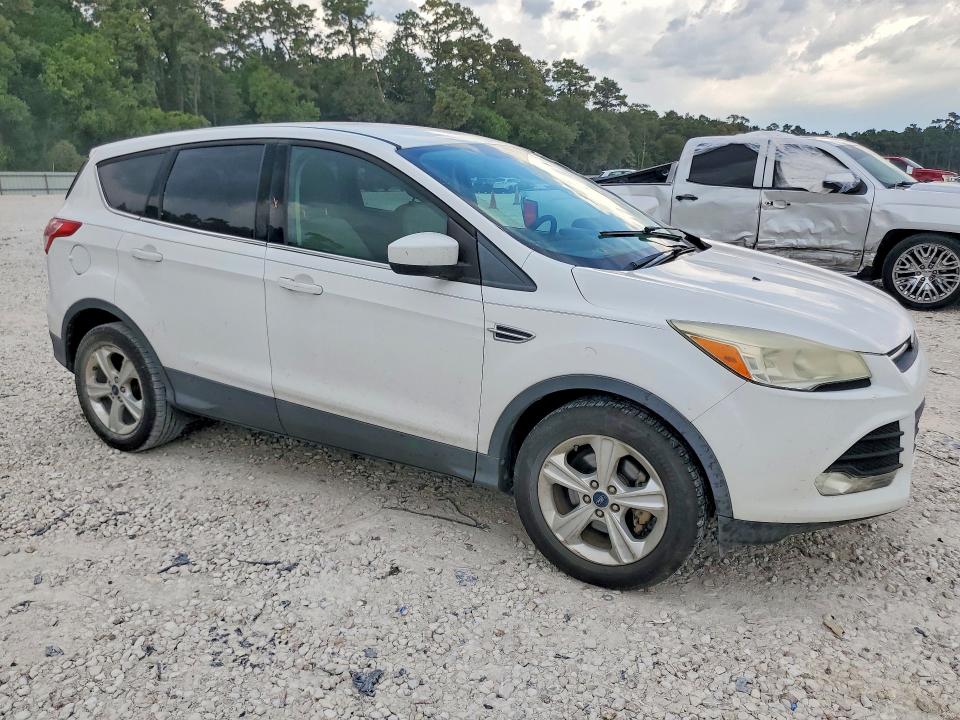 Photo 4 from auction – 2013 FORD ESCAPE with VIN 1FMCU0GX3DUD55582