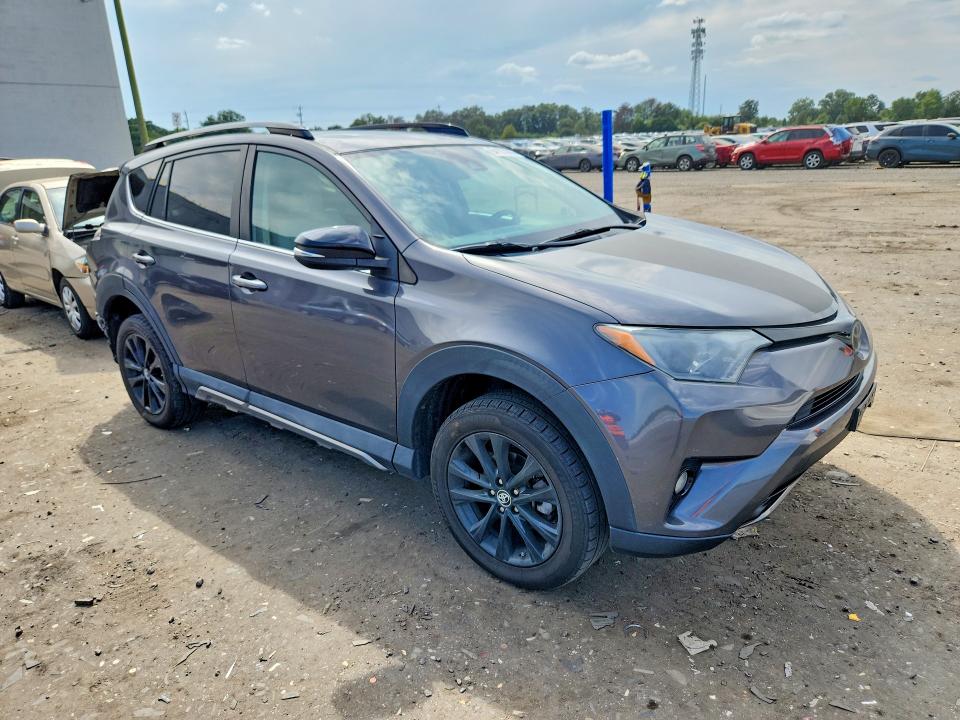 Photo 4 from auction – 2018 TOYOTA RAV4 with VIN 2T3RFREV7JW701940