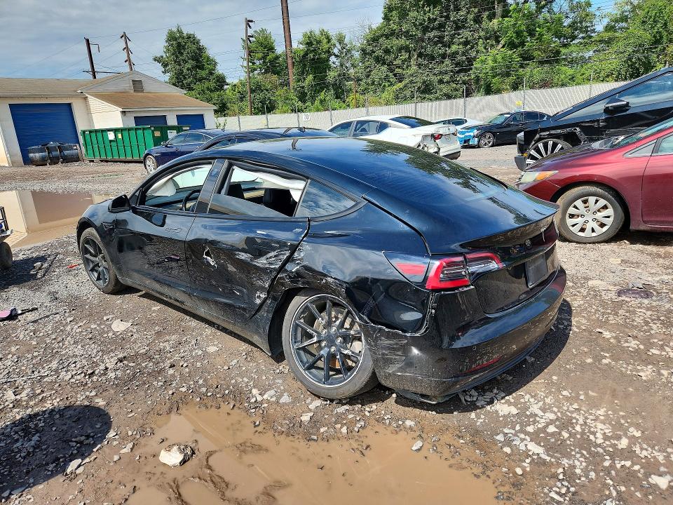 Photo 2 from auction – 2021 TESLA MODEL 3 with VIN 5YJ3E1EA8MF029050