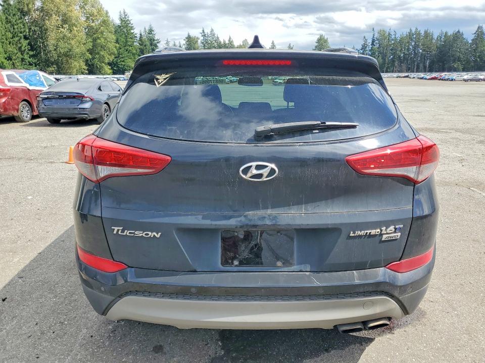 Photo 6 from auction – 2018 HYUNDAI TUCSON with VIN KM8J3CA25JU717044