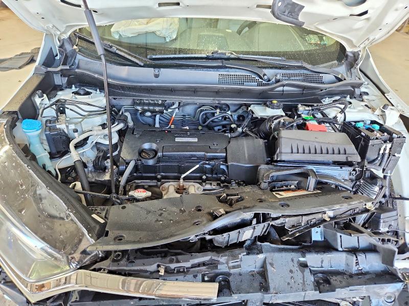 Photo 12 from auction – 2018 HONDA CR-V with VIN 2HKRW5H34JH414856