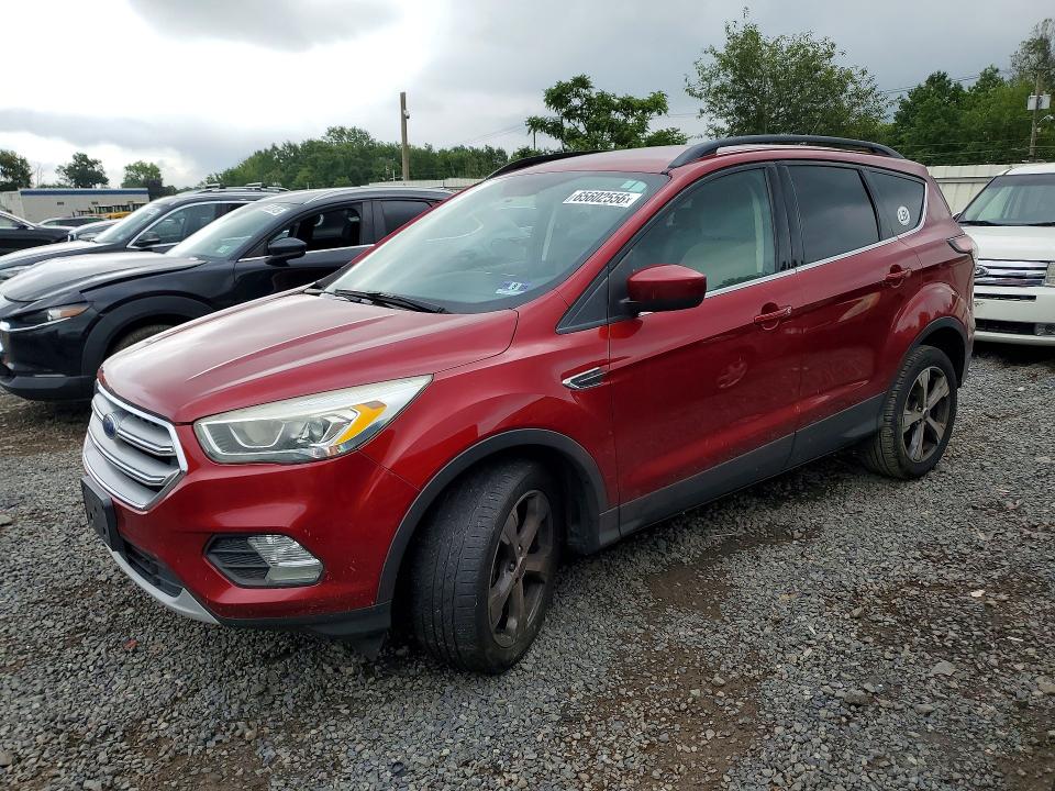 FORD ESCAPE 2017 with VIN 1FMCU9GDXHUA86240 - Photo from auction