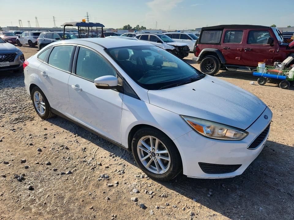 Photo 4 from auction – 2016 FORD FOCUS with VIN 1FADP3F27GL391234