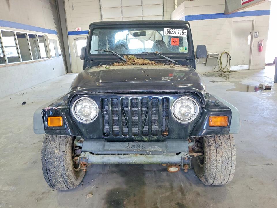 Photo 5 from auction – 1998 JEEP WRANGLER / TJ with VIN 1J4FY19S7WP774883