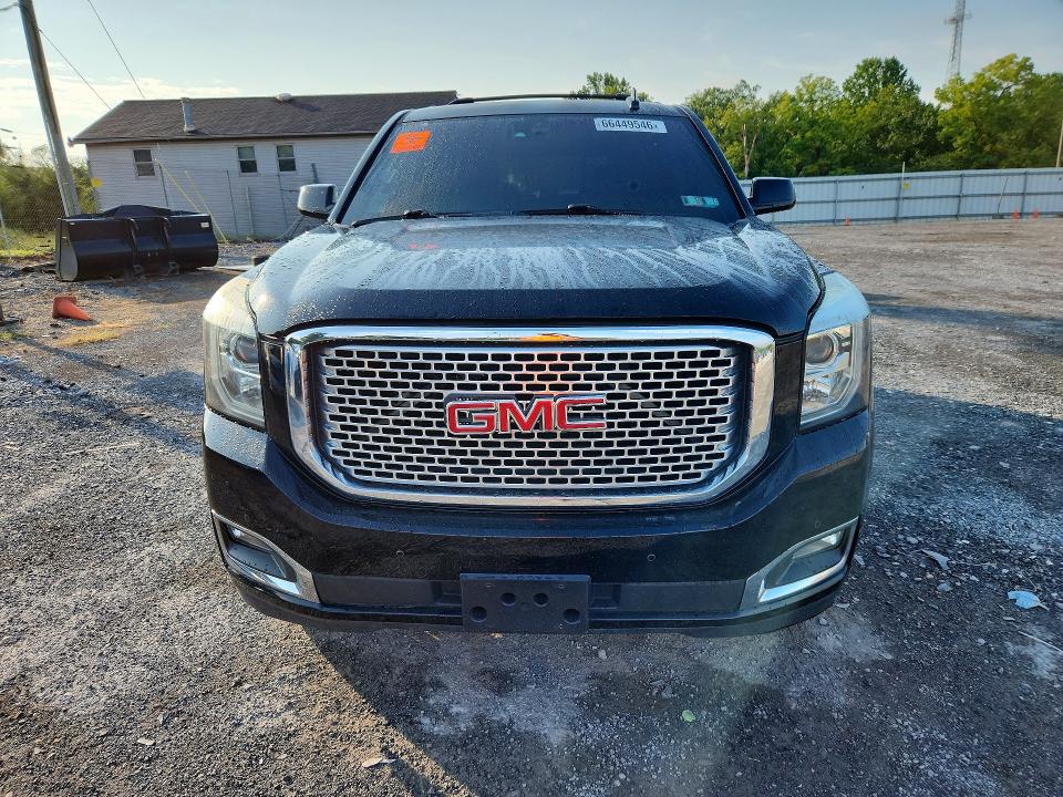 Photo 5 from auction – 2016 GMC YUKON with VIN 1GKS2CKJXGR428940