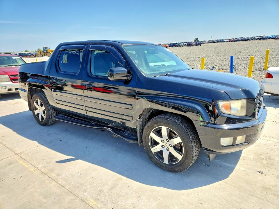 Photo 4 from auction – 2014 HONDA RIDGELINE with VIN 5FPYK1F60EB004418