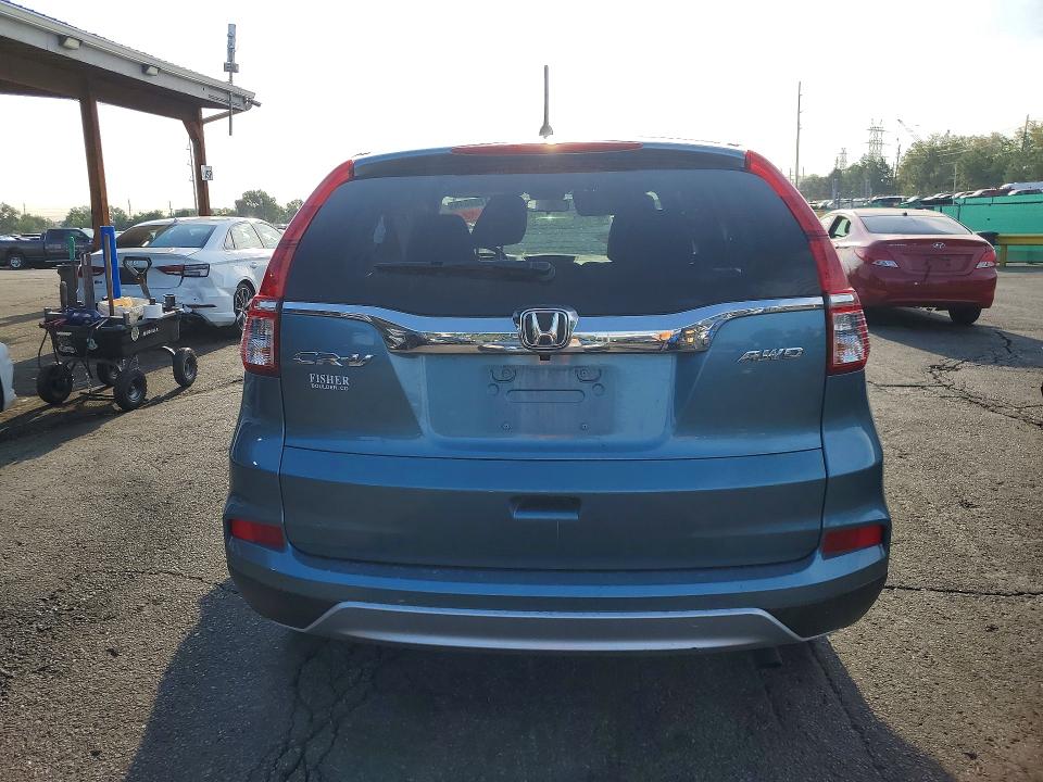 Photo 6 from auction – 2015 HONDA CR-V with VIN 2HKRM4H50FH688421
