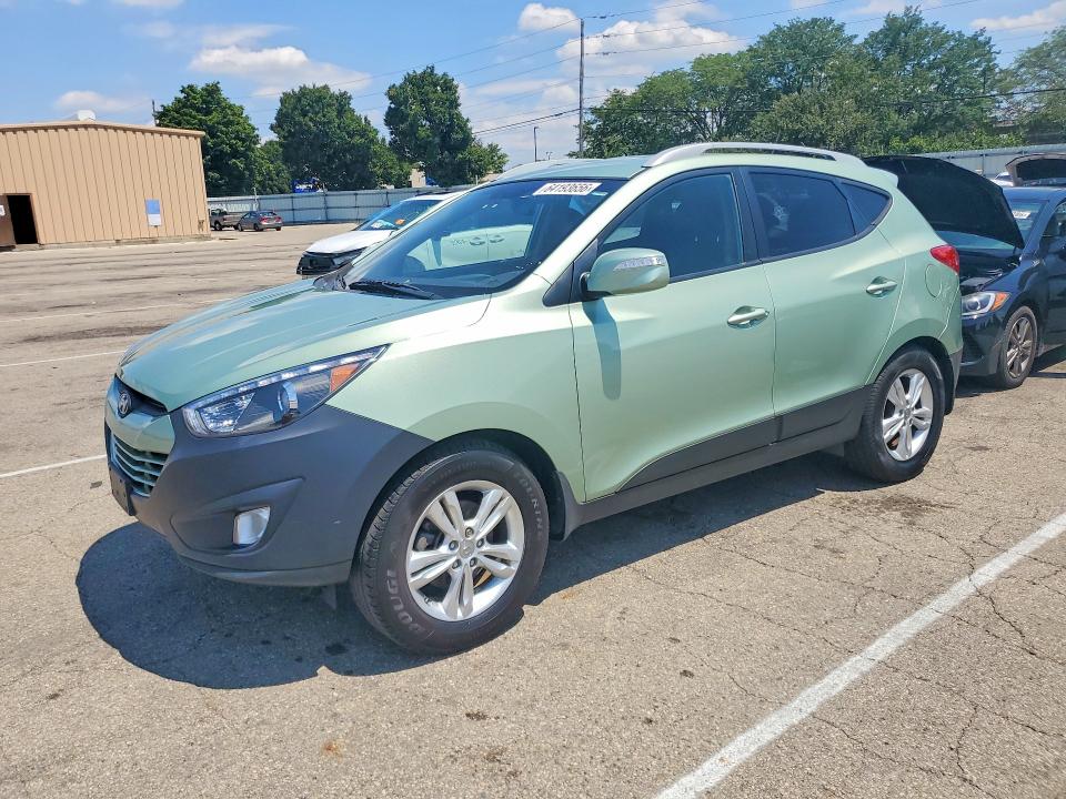 HYUNDAI TUCSON 2013 with VIN KM8JUCAC9DU685970 - Photo from auction