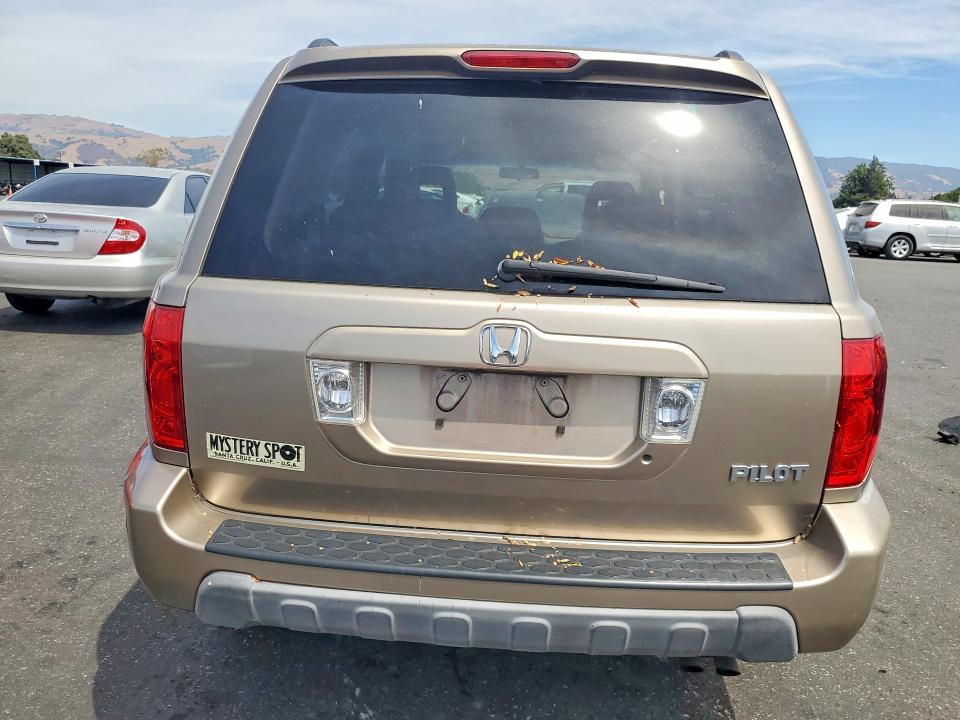 Photo 6 from auction – 2004 HONDA PILOT with VIN 2HKYF18464H616678