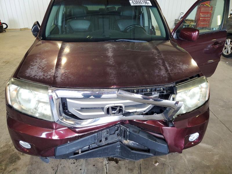Photo 12 from auction – 2011 HONDA PILOT with VIN 5FNYF4H61BB079992