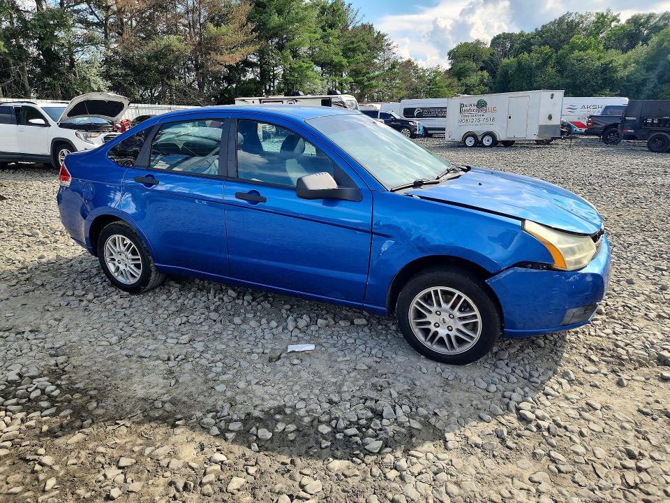 Photo 4 from auction – 2011 FORD FOCUS with VIN 1FAHP3FN8BW128298