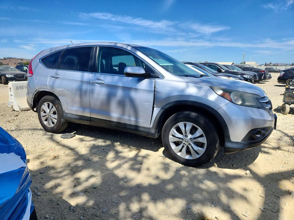 Photo 4 from auction – 2014 HONDA CR-V with VIN 3CZRM3H55EG702390