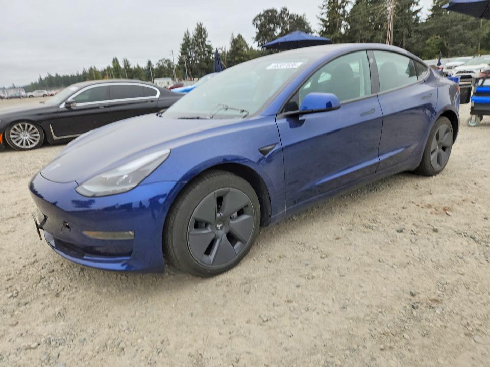 TESLA MODEL 3 2022 with VIN 5YJ3E1EB8NF107823 - Photo from auction