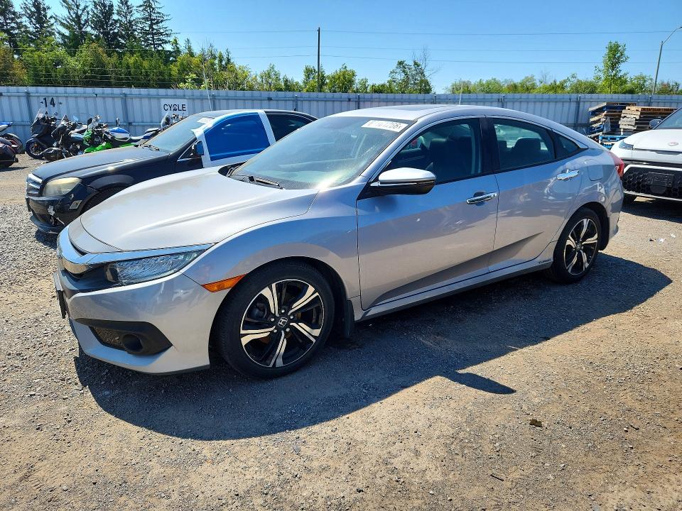 HONDA CIVIC 2018 with VIN 2HGFC1F90JH102751 - Photo from auction