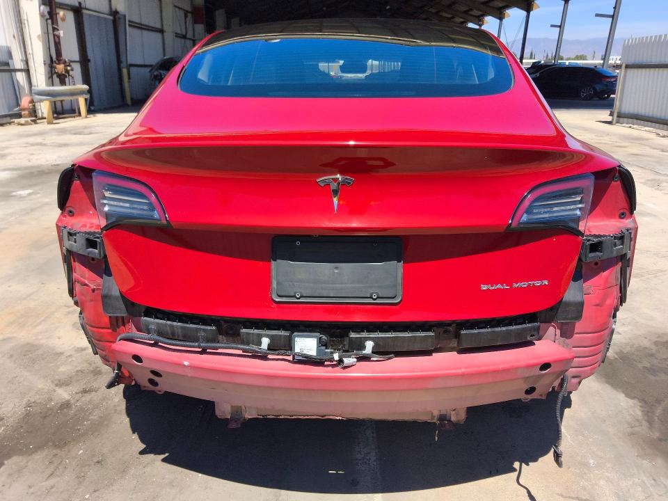 Photo 6 from auction – 2022 TESLA MODEL 3 with VIN 5YJ3E1EB2NF305054