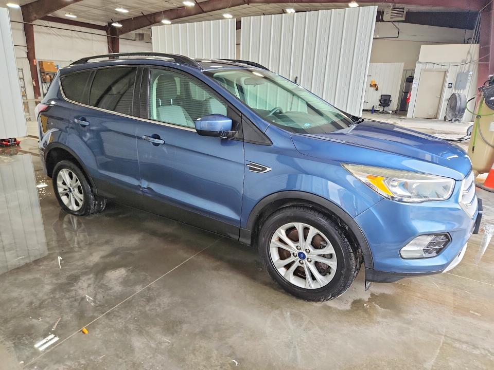 Photo 4 from auction – 2018 FORD ESCAPE with VIN 1FMCU9GD3JUA87736