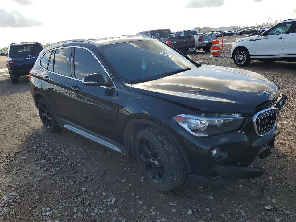 Photo 4 from auction – 2019 BMW X1 with VIN WBXHU7C52K5L10618
