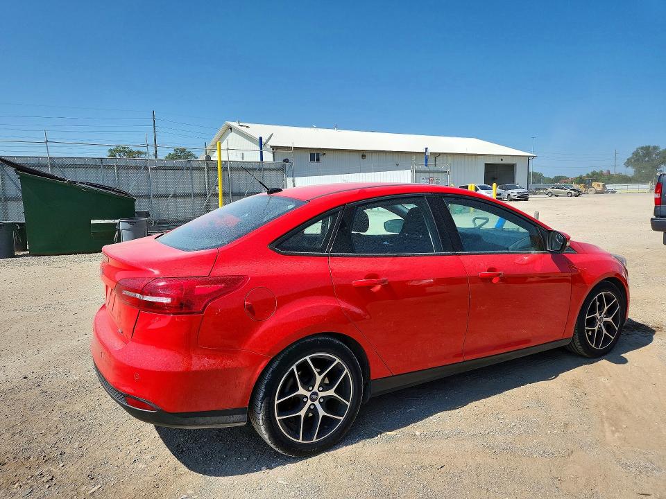 Photo 3 from auction – 2017 FORD FOCUS with VIN 1FADP3H23HL264429