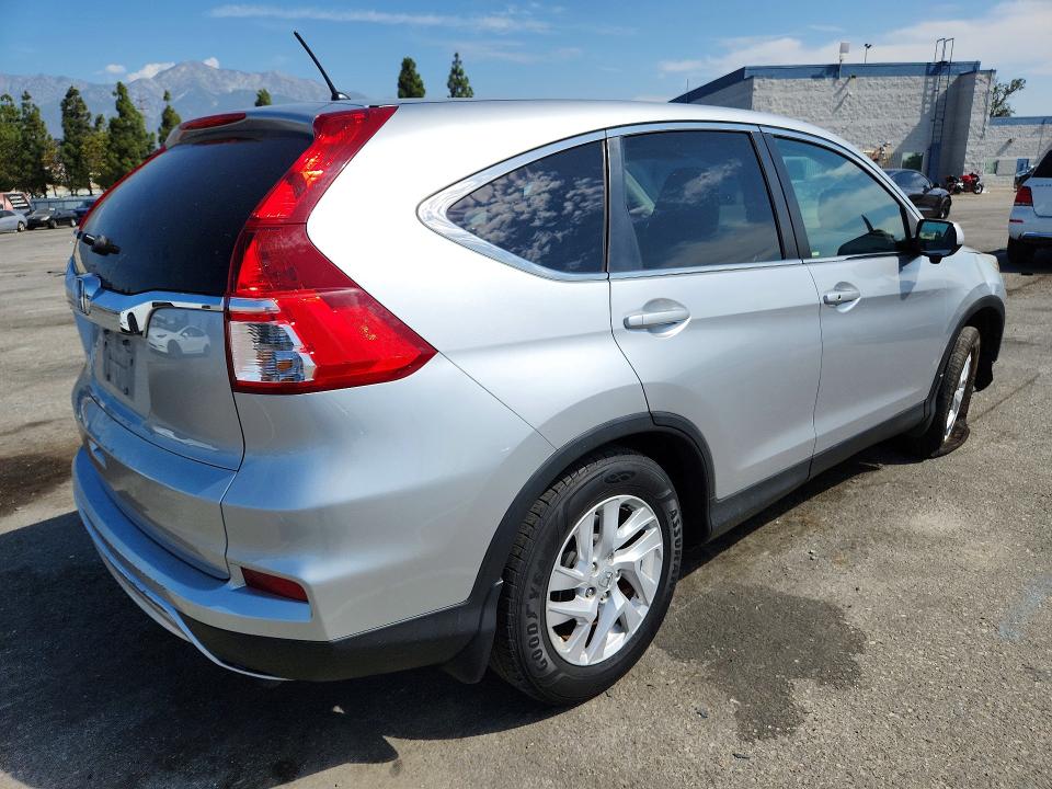 Photo 3 from auction – 2016 HONDA CR-V with VIN 3CZRM3H58GG702399