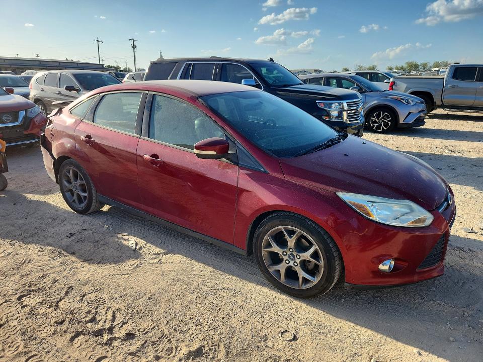 Photo 4 from auction – 2013 FORD FOCUS with VIN 1FADP3F26DL116160