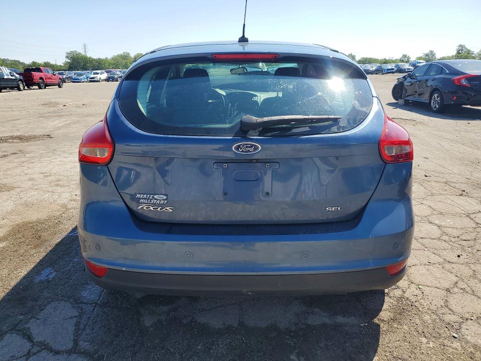 Photo 6 from auction – 2018 FORD FOCUS with VIN 1FADP3M28JL243975