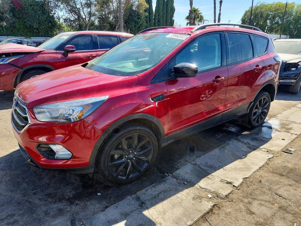 FORD ESCAPE 2017 with VIN 1FMCU0GD9HUC67731 - Photo from auction