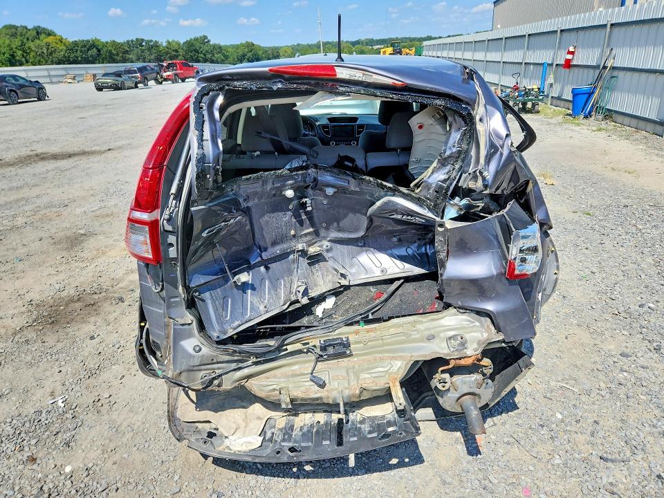 Photo 6 from auction – 2016 HONDA CR-V with VIN 2HKRM4H51GH711738