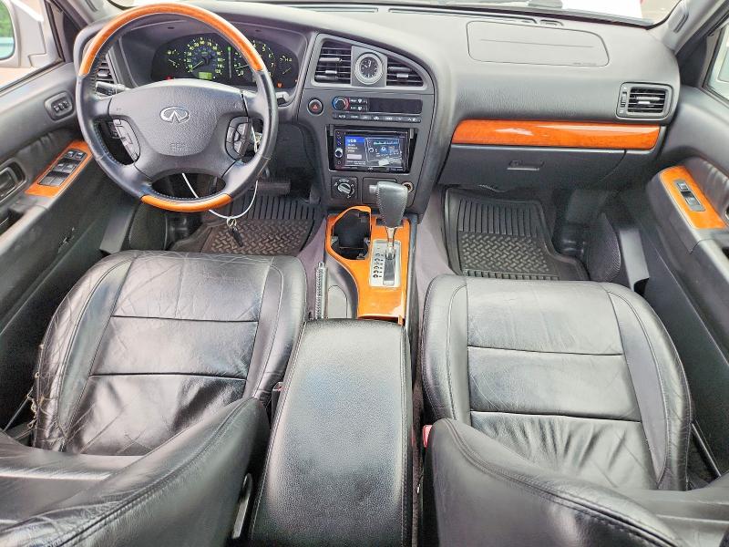 Photo 8 from auction – 2003 INFINITI QX4 with VIN JNRDR09Y13W300812