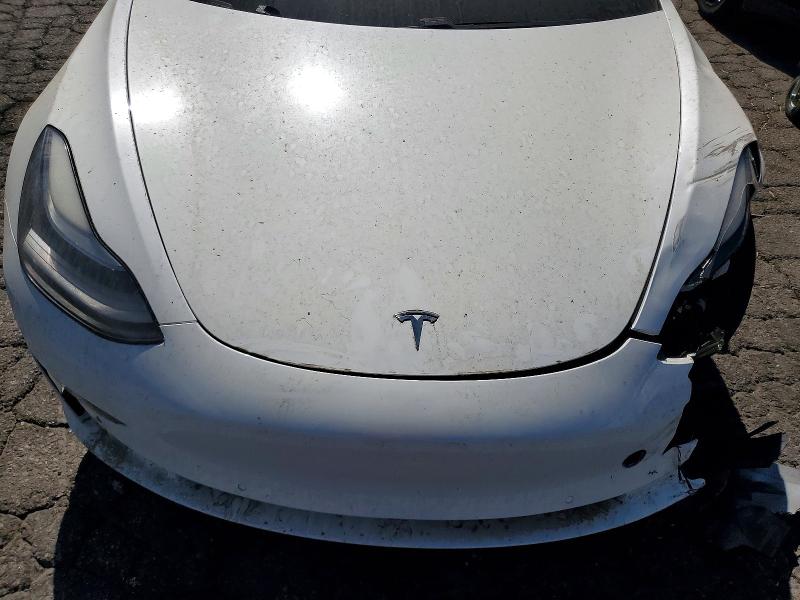 Снимка 11 от търг – 2021 TESLA MODEL 3 с VIN 5YJ3E1ECXMF072225