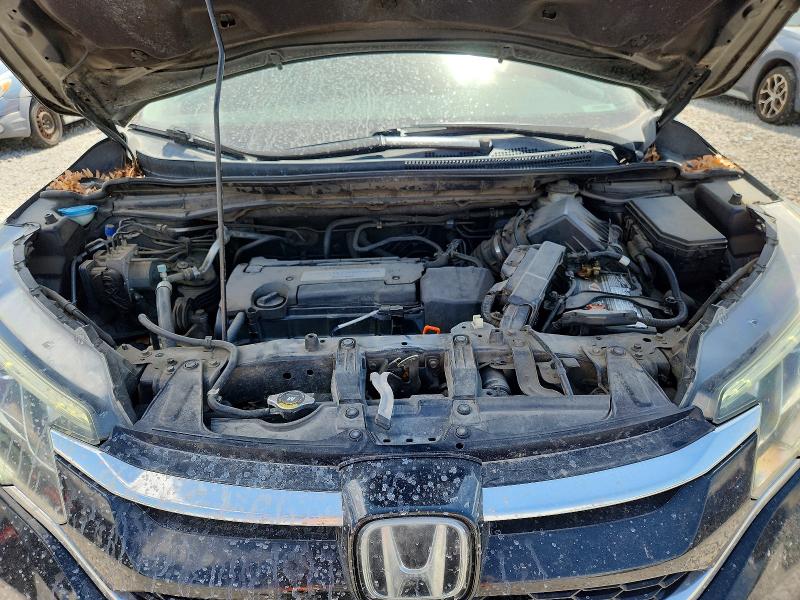 Photo 11 from auction – 2015 HONDA CR-V with VIN 5J6RM3H96FL002806