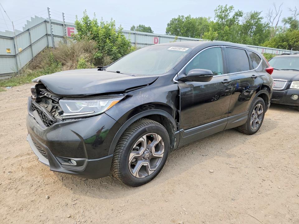 HONDA CR-V 2018 with VIN 7FARW2H54JE102510 - Photo from auction