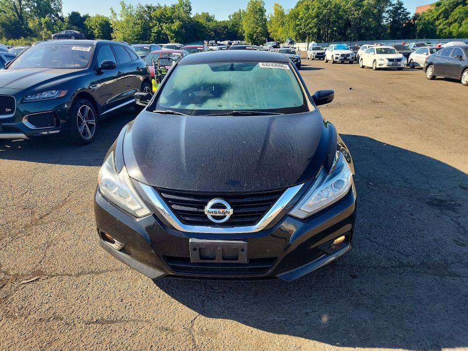 Photo 5 from auction – 2018 NISSAN ALTIMA with VIN 1N4AL3AP1JC121571