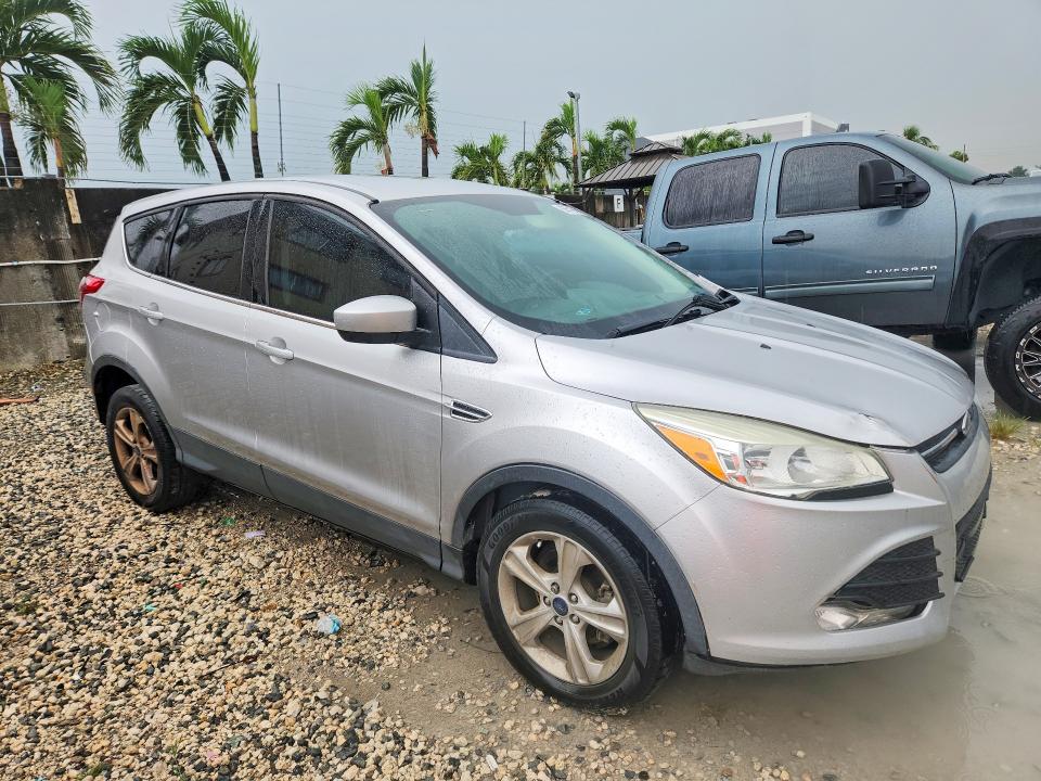Photo 4 from auction – 2015 FORD ESCAPE with VIN 1FMCU0GX4FUC74304